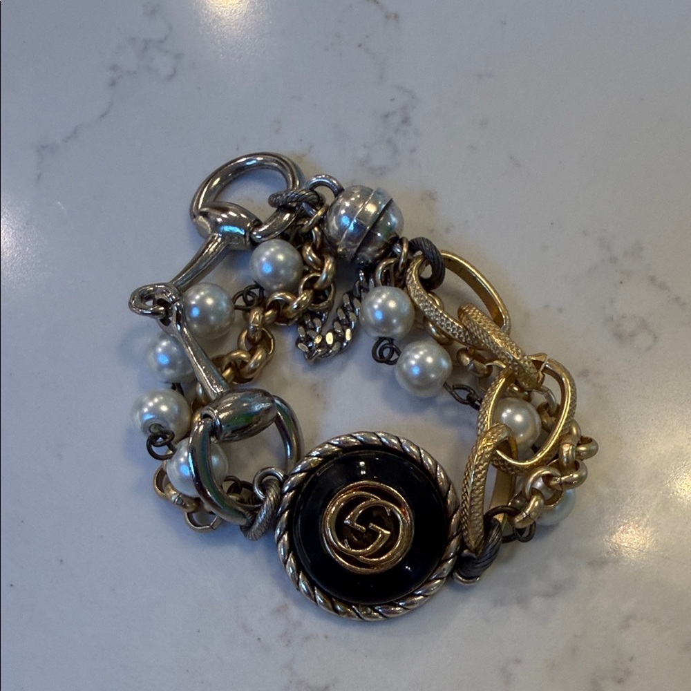 Gold & Pearl Multi-Chain Bracelet with Black Centre Medallion